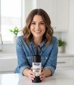 Woman holding a bottle of 'Wipe Right' cleaner in a kitchen setting