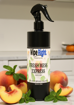 Bottle of Wipe Right Fresh Mess Express cleaner with peaches and mint leaves on a kitchen counter.