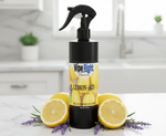 Wipe Right Lemon-Aid multi-purpose cleaner bottle with lemons and lavender on a kitchen counter.
